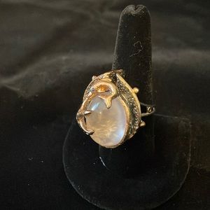 Silver and rose quartz ring dolphin and starfish design.